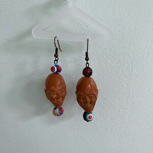 Chinese Carved Jolly Face Olive Pit Earrings